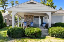 Sixties Shore House · Sandy Beachfront House on Grand Traverse B